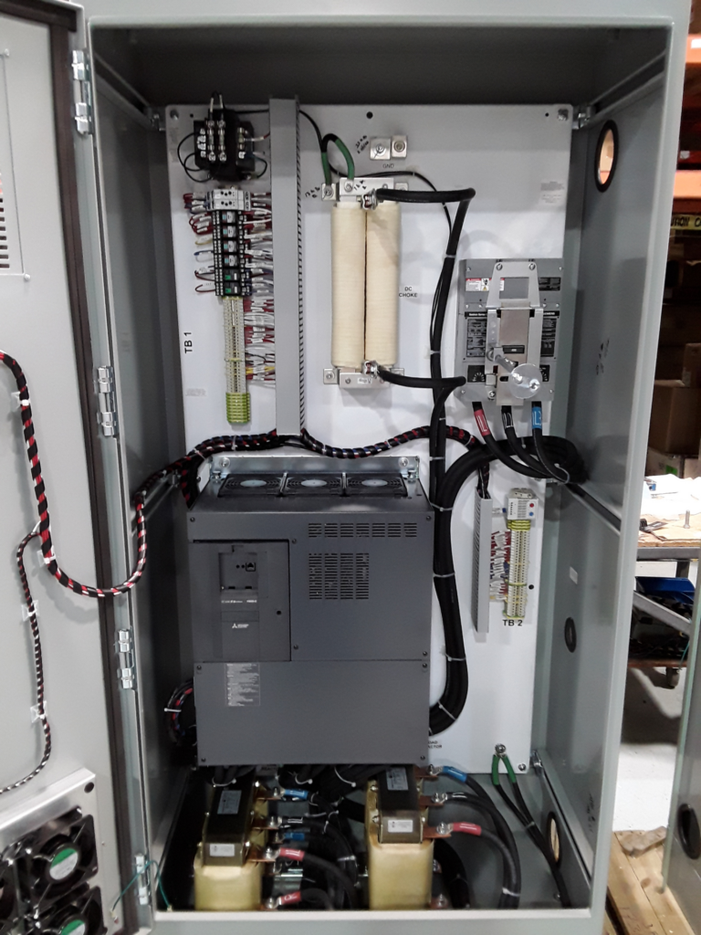 VFD panel with controls, harmonic mitigation, and connection to bypass